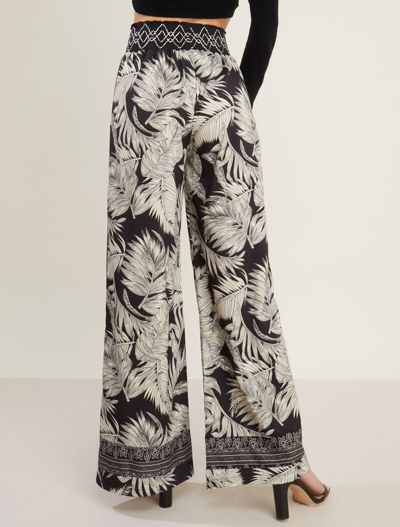 Pantalon flare à imprimés - noir - 2