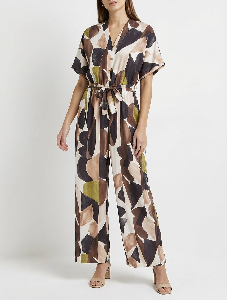 Abstracte print jumpsuit met elastische taille. - Zwart