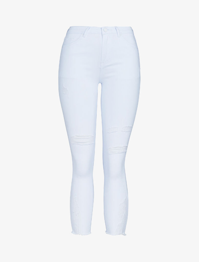 Jean 7/8 met gescheurde knieën en versleten details - wit