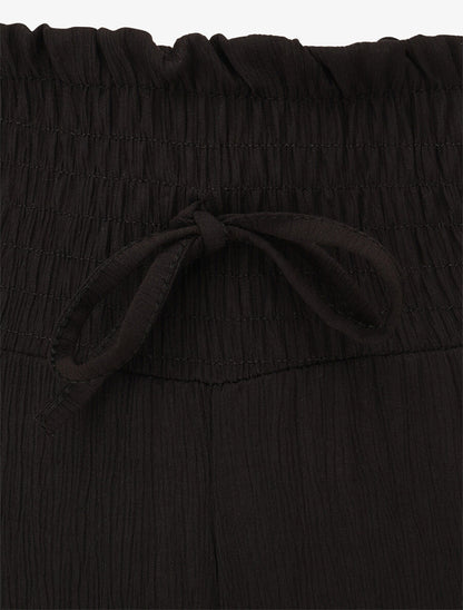 Pantalon fluide et texturé à taille haute - Noir - 3
